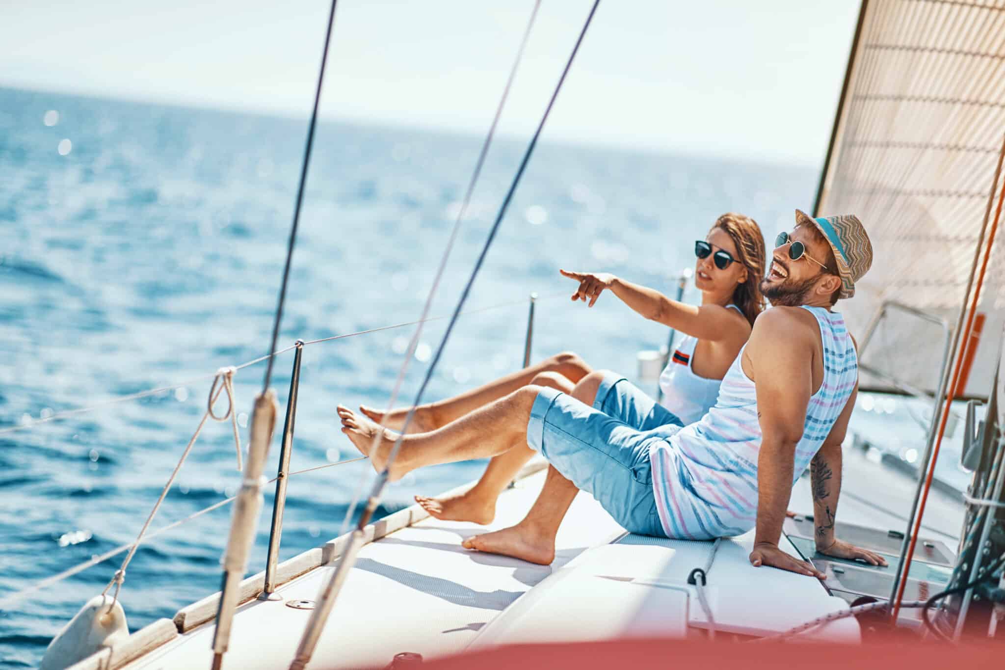 a couple enjoying sailing